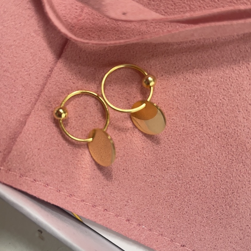 Gold huggie earring